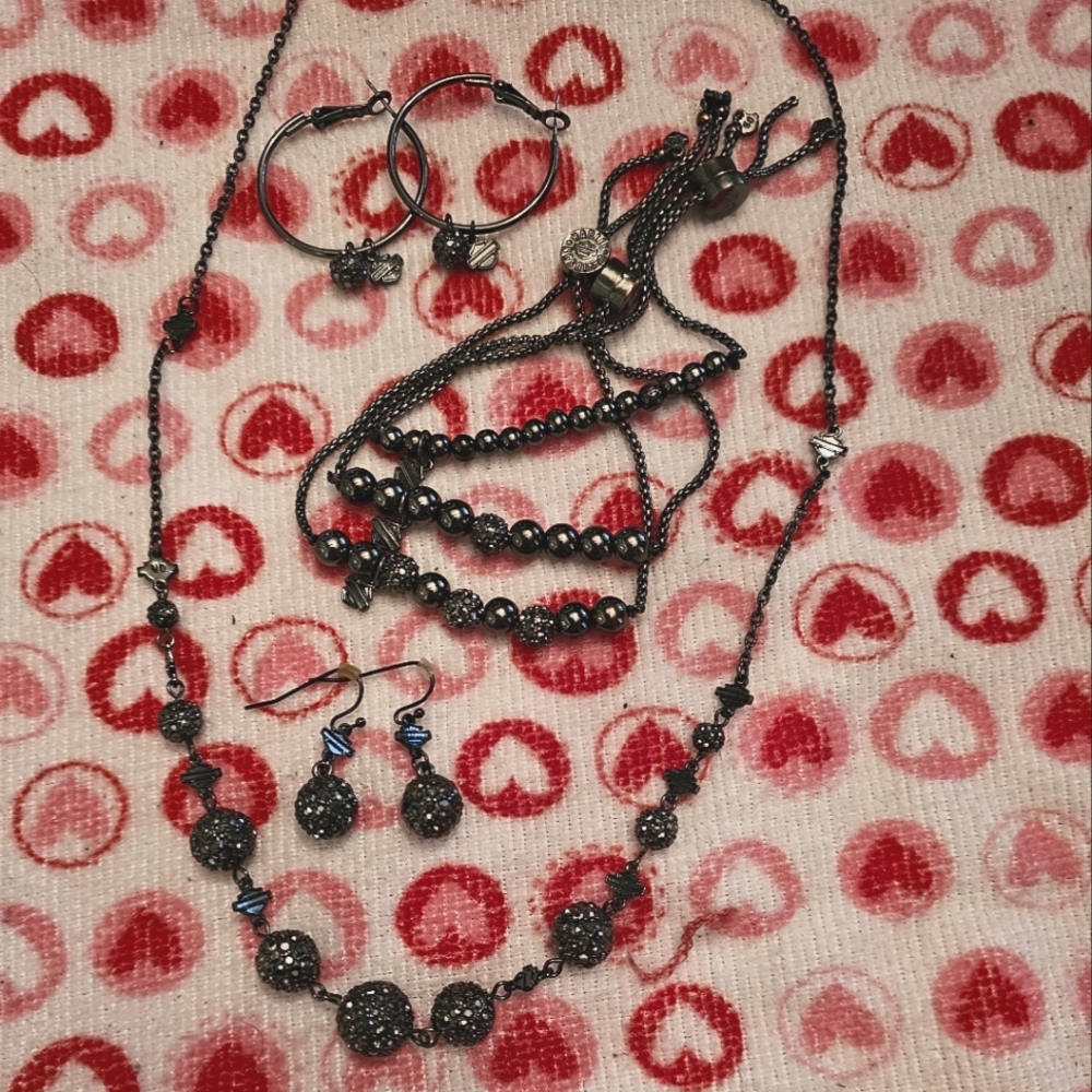 Harley Davidson necklace, bracelets, and earrings.